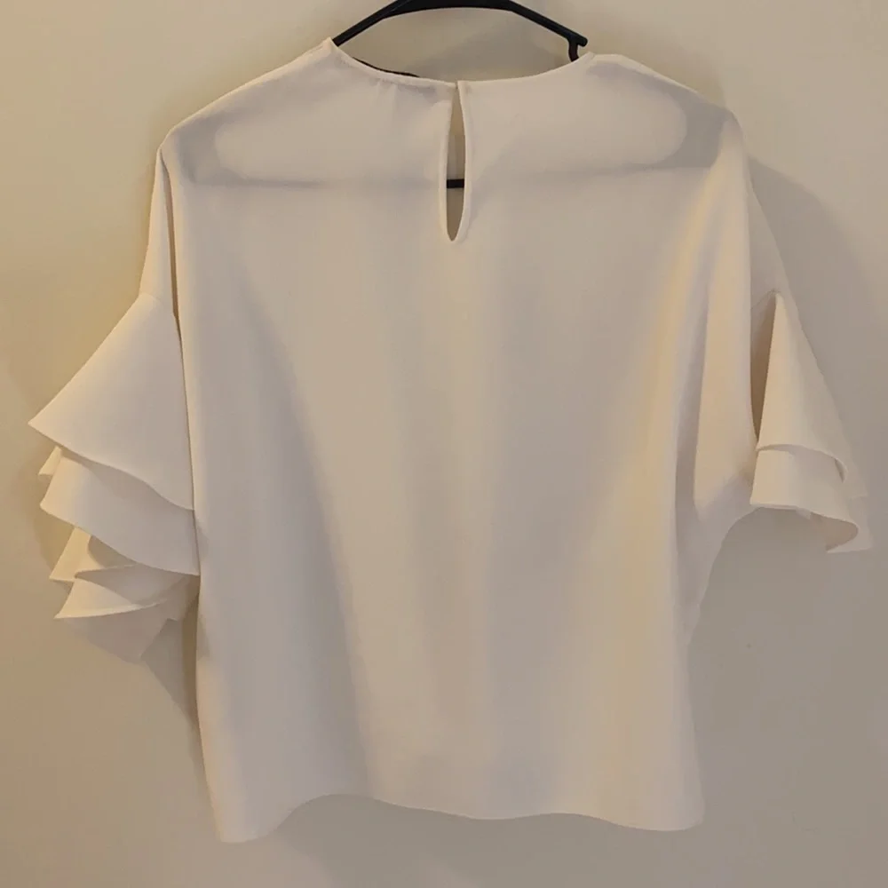 - Zara white puff sleeve blouse